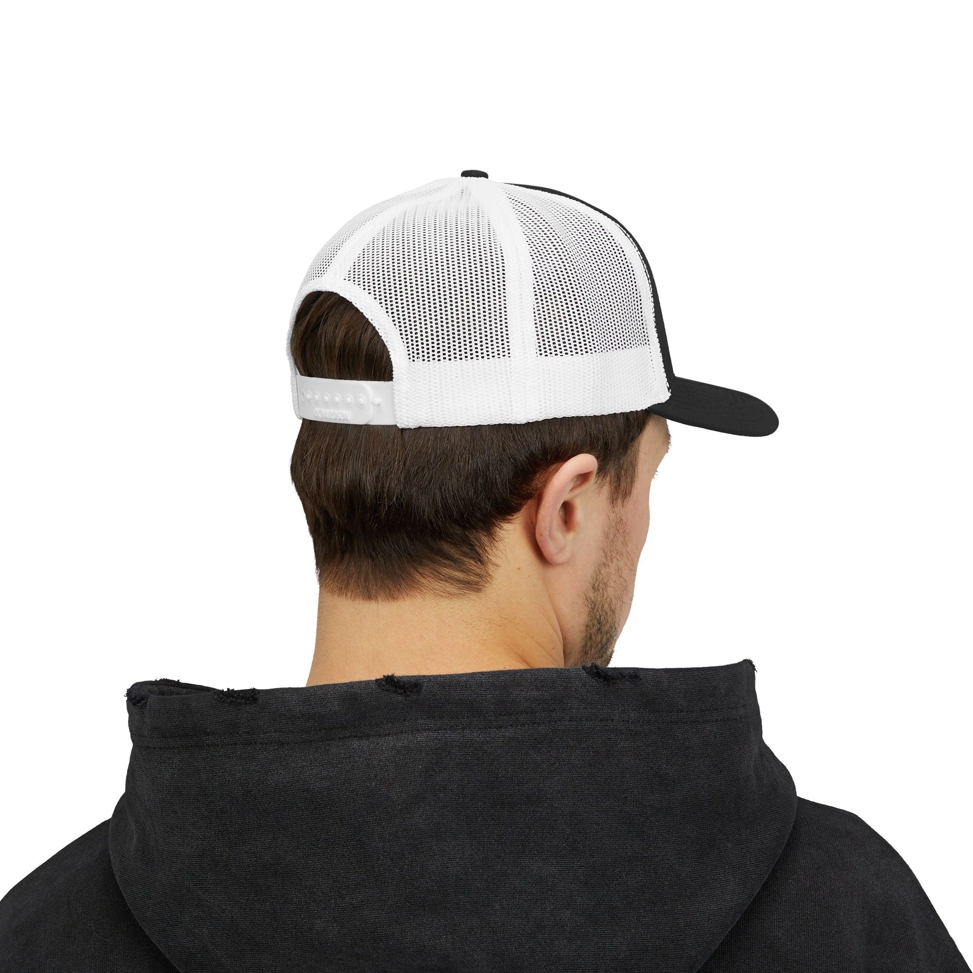 Back of a person wearing a black and white mesh trucker hat and black hoodie.