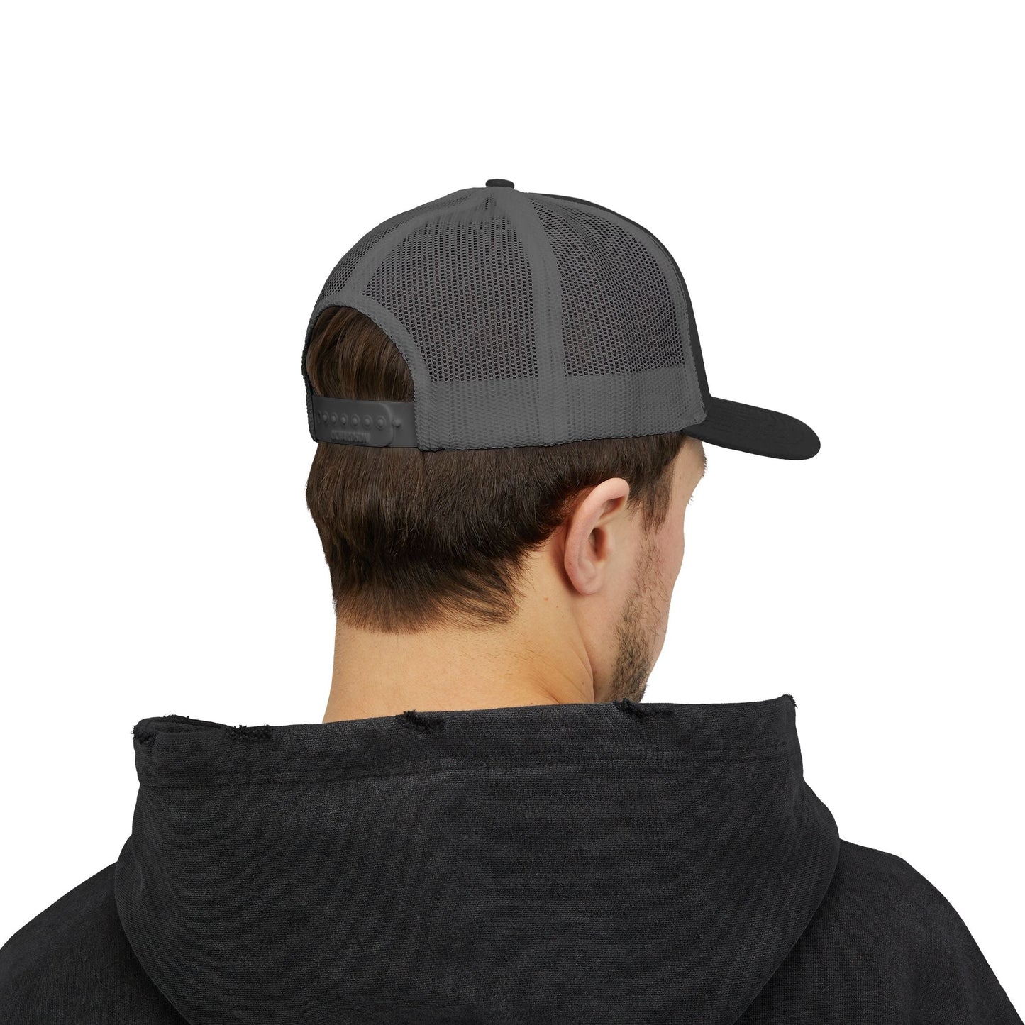 Back of a person wearing a gray trucker hat and a black hoodie.